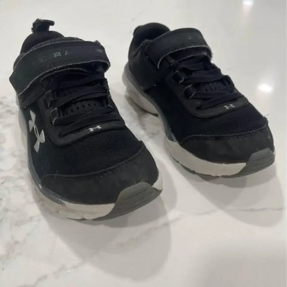 12K Shoes Sneakers black silver some wear toddler Under Armour tennis shoes